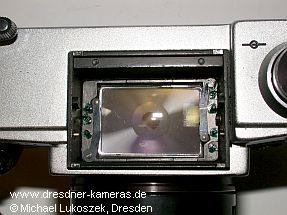 Interchangeable field lenses at the connection point for interchangeable viewfinders