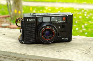 The Canon AF35M is basically a solid plastic brick, disguised as a camera.